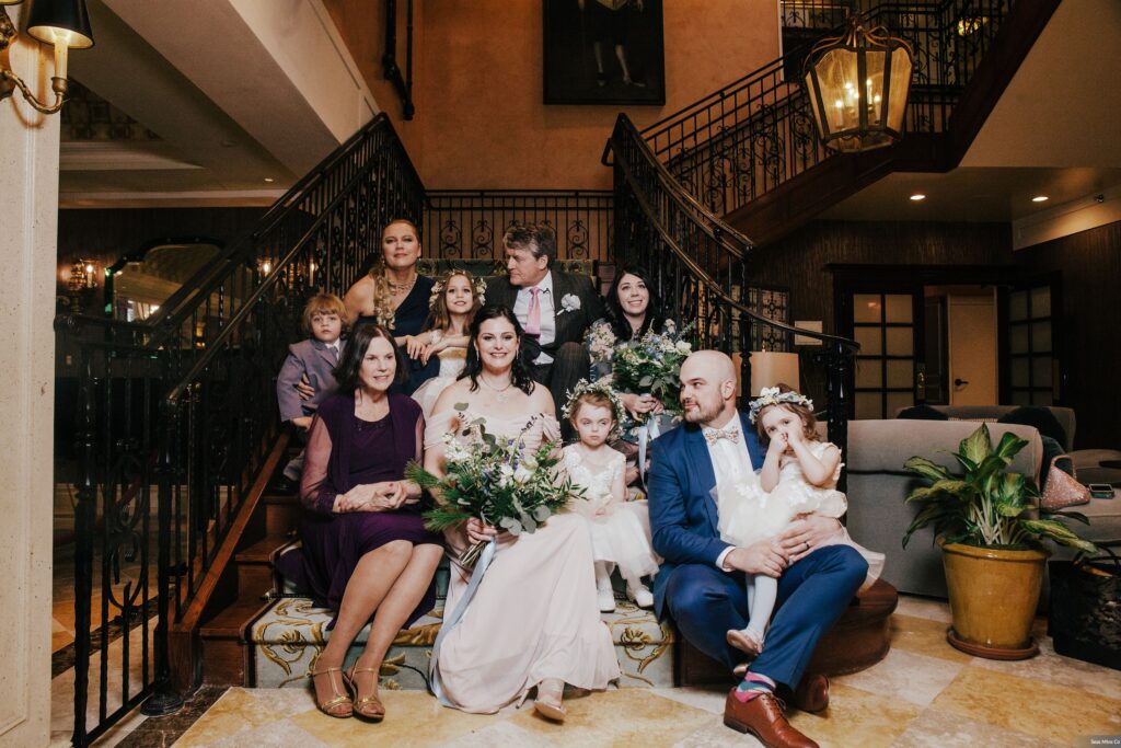 Family Portrait at Lescale Wedding in Greenwich CT in front of winding stairs