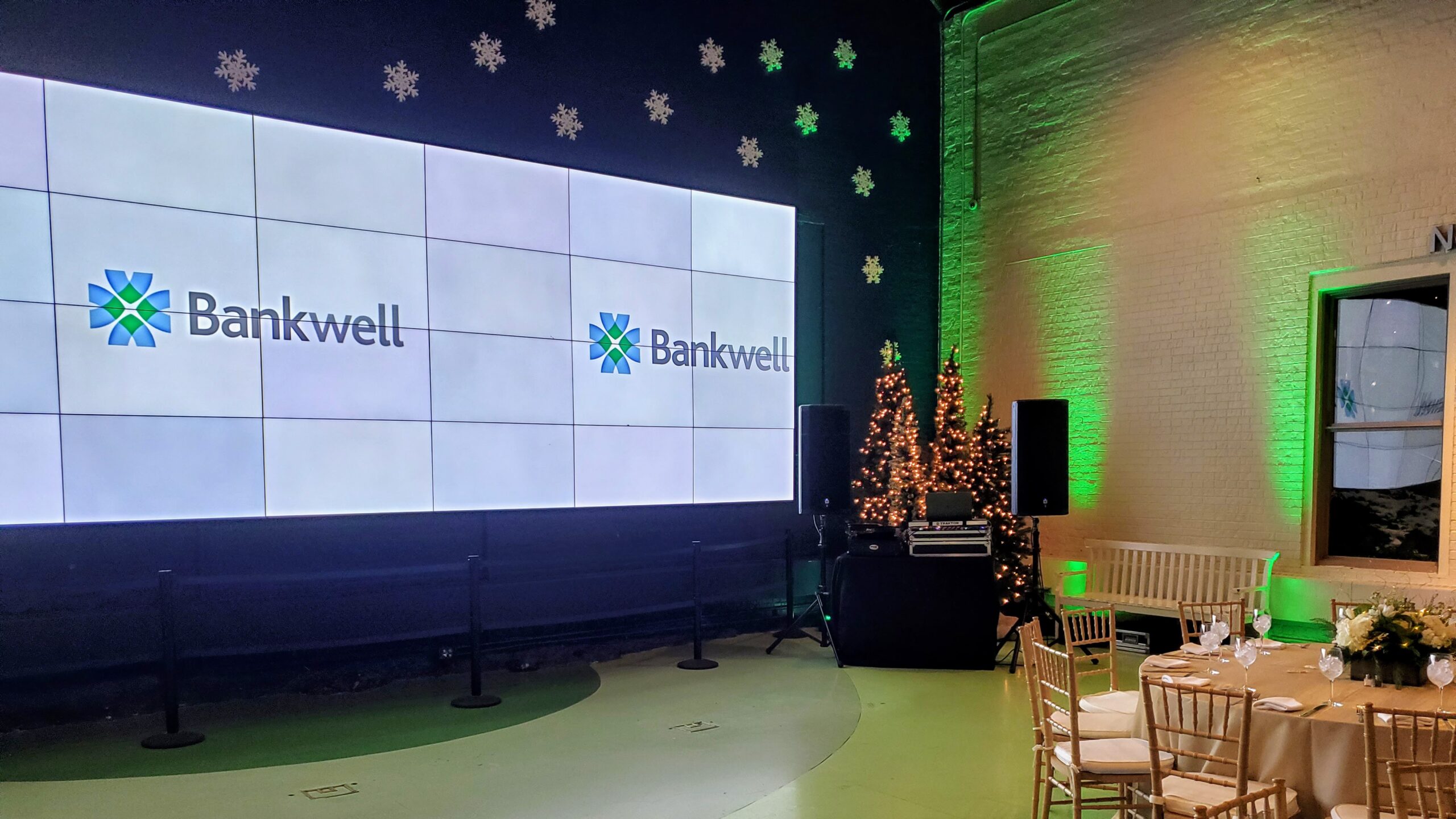 Video wall at Maritime Aquarium in Norwalk at a holiday party for Bankwell with logo
