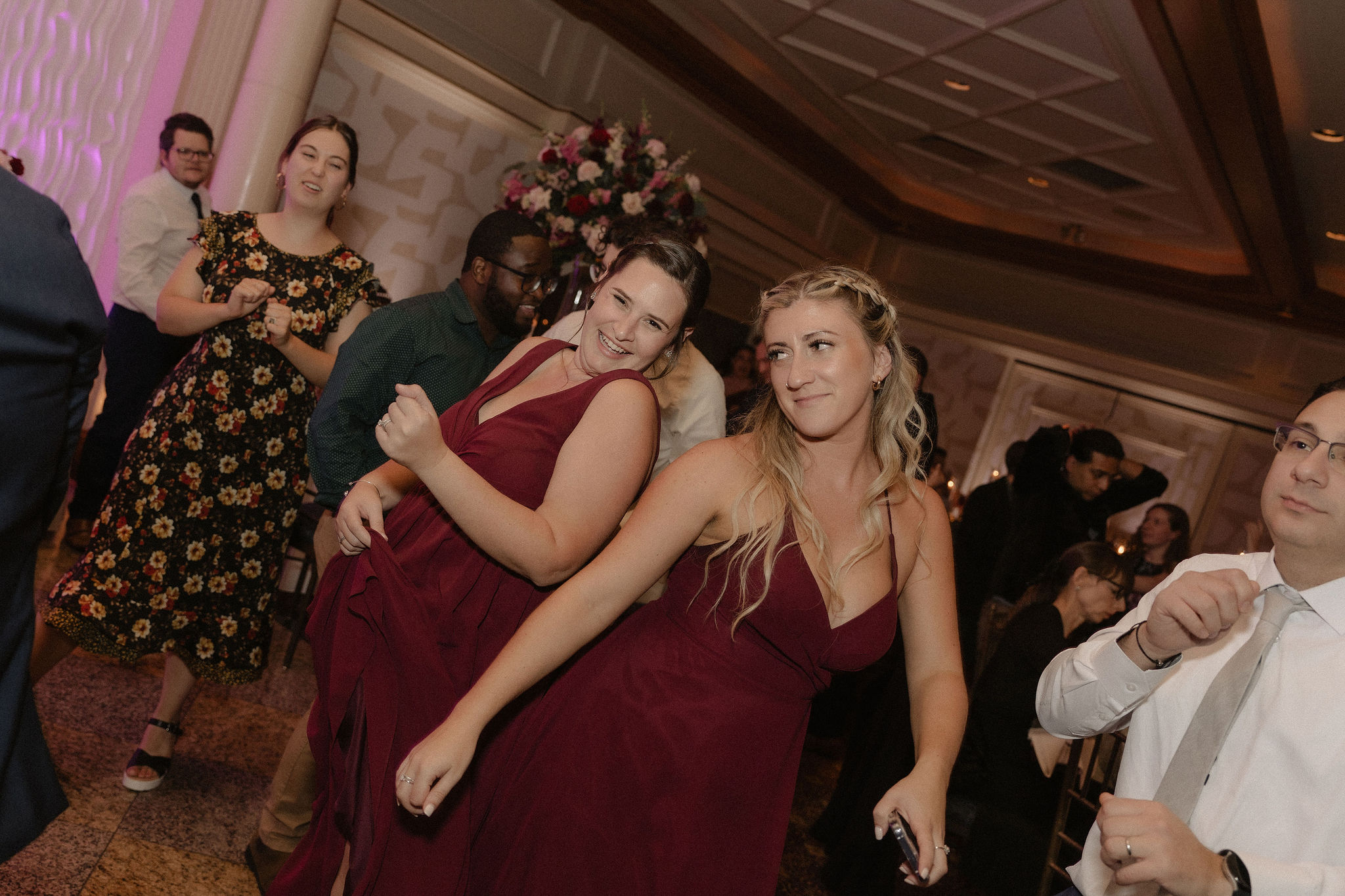 bridesmaids dancing at wedding reception at giovanni waters edge