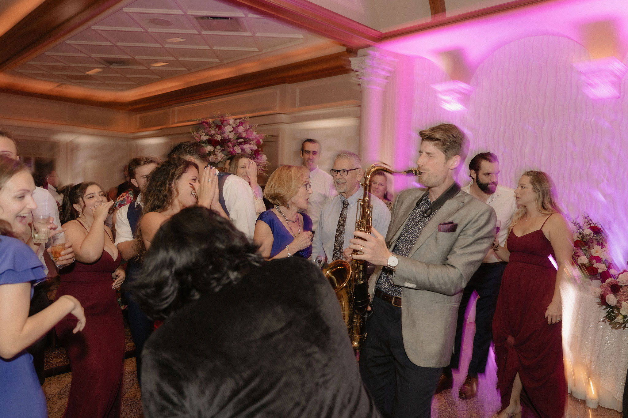 saxophone player at wedding reception at giovanni waters edge
