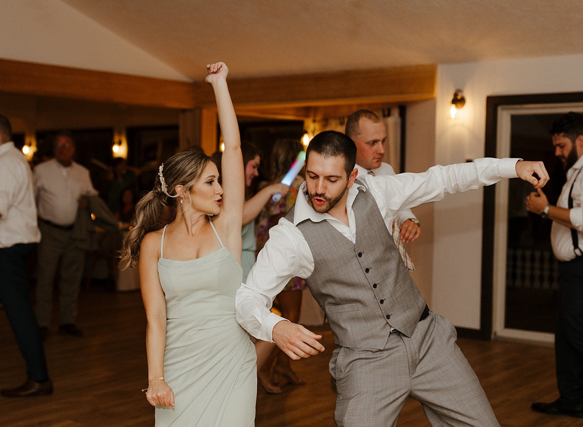 dj dan moran dancing with bridesmaid on the dance floor at a Magnanini Winery wedding