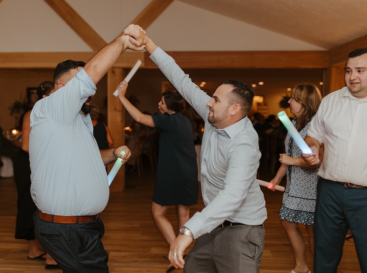 group of men on the dance floor at a new york wedding