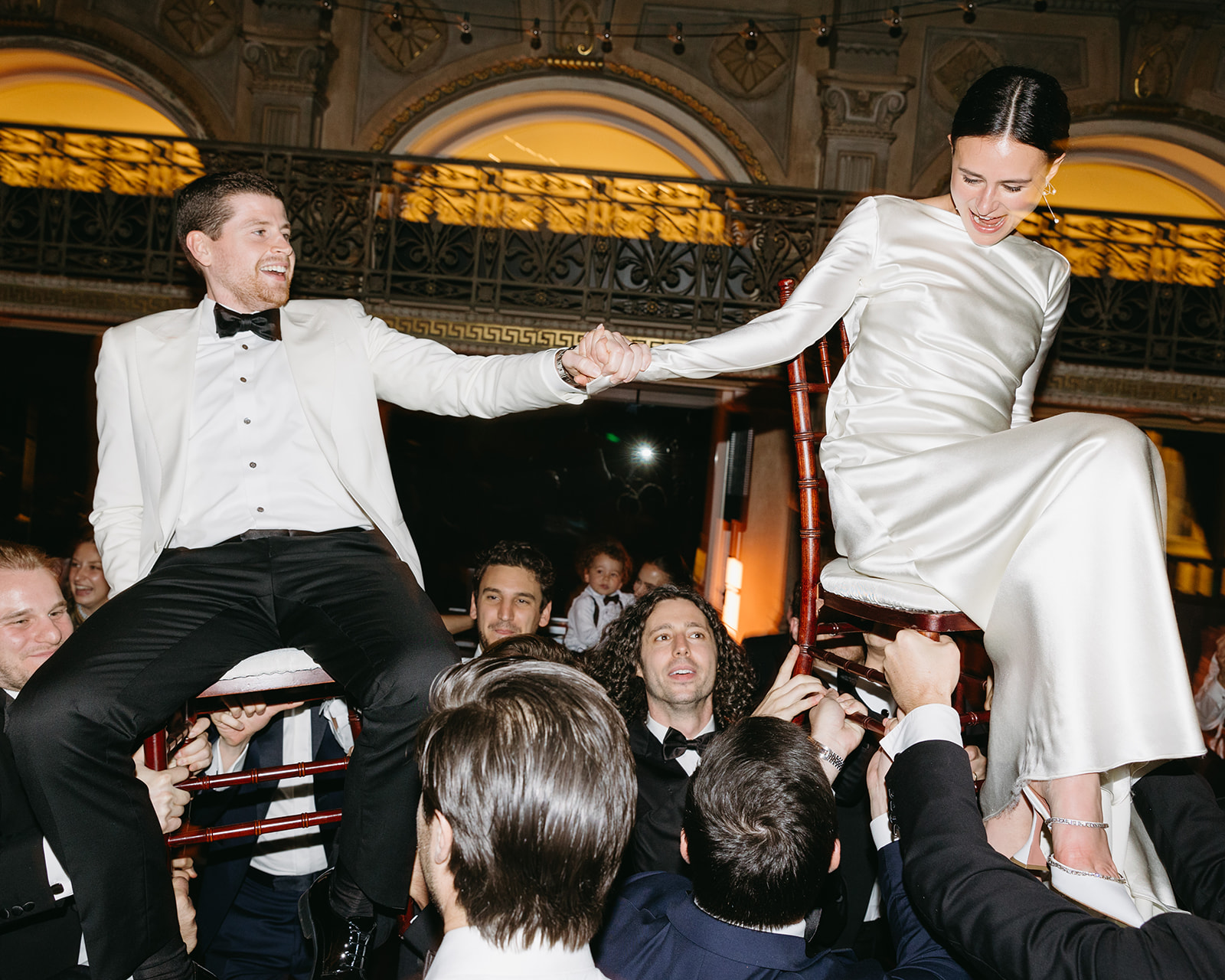 bride and groom during hora at george peabody library wedding