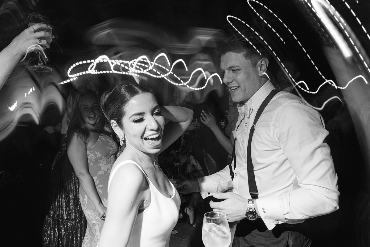 close up of bride and groom on dancefloor