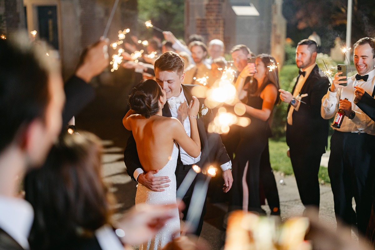 bride and groom sparkler exit at waveny park wedding