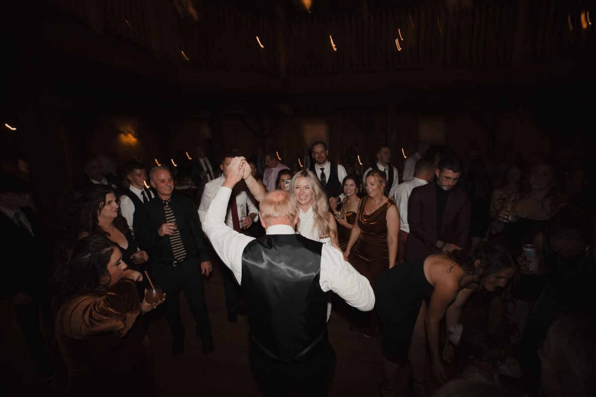 Bride dancing with dad at her wedding on dancefloor at The Preserve at Chocorua in Tamworth NH